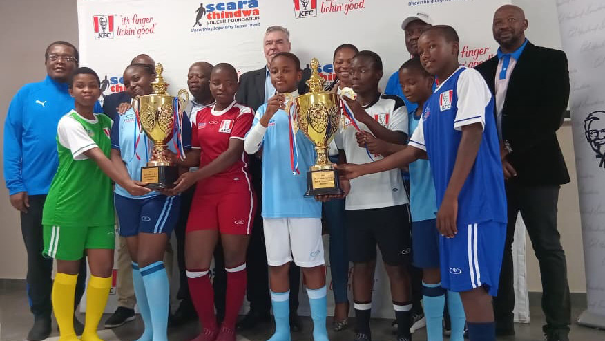 ESSA Vice President Thami Shongwe (R back row) after the kit presentation. (Pic: Machawe Fakudze)
